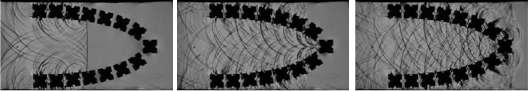 Shock wave interaction with obstacles placed in a logarithmic spiral pattern